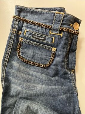 Rare Dolce Gabbana straight leg jeans trimmed with heavy bronze chain. Sz 40